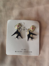 Introducing the Artistic Black Abstract Dangle Earrings — a bold statement for trend lovers.