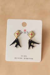 Introducing the Artistic Black Abstract Dangle Earrings — a bold statement for trend lovers.